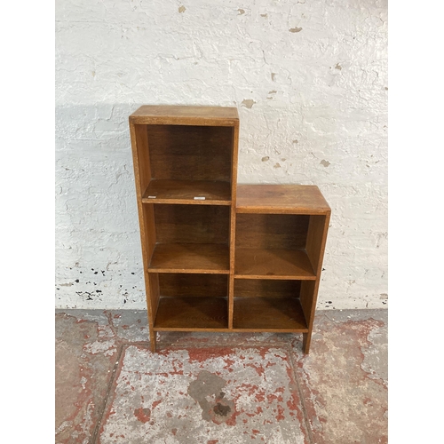 157 - A 1930s oak five section bookcase - approx. 100cm high x 67cm wide x 21cm deep