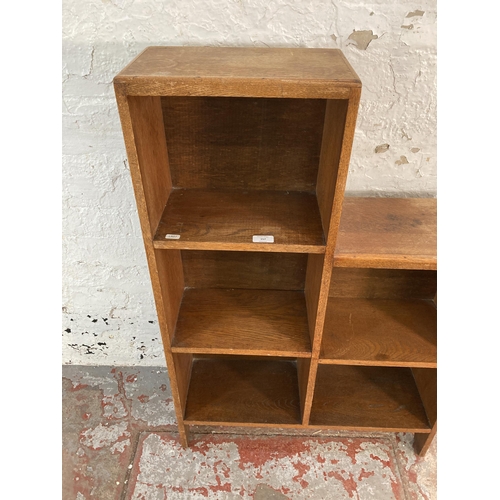 157 - A 1930s oak five section bookcase - approx. 100cm high x 67cm wide x 21cm deep