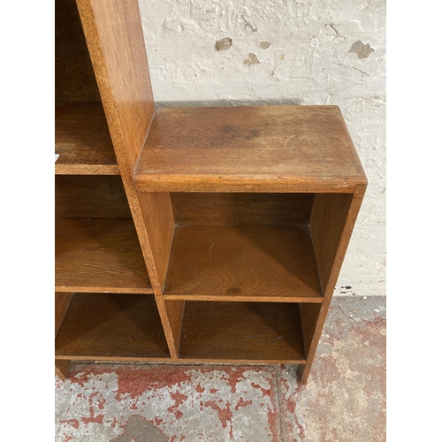 157 - A 1930s oak five section bookcase - approx. 100cm high x 67cm wide x 21cm deep