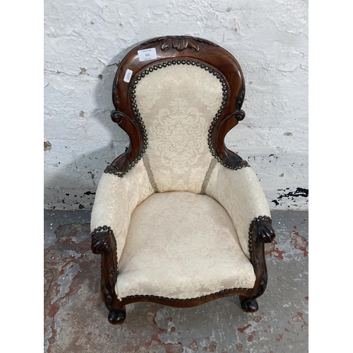 161 - A Victorian style carved mahogany and floral fabric upholstered doll’s spoon back armchair - approx.... 