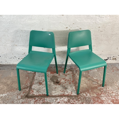 167 - A pair of IKEA Teodores green plastic and metal stacking chairs