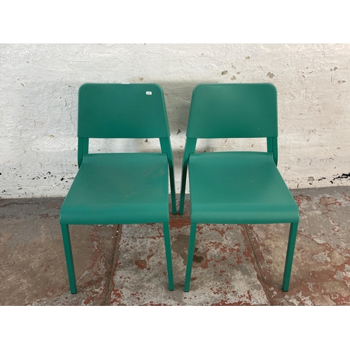 167 - A pair of IKEA Teodores green plastic and metal stacking chairs