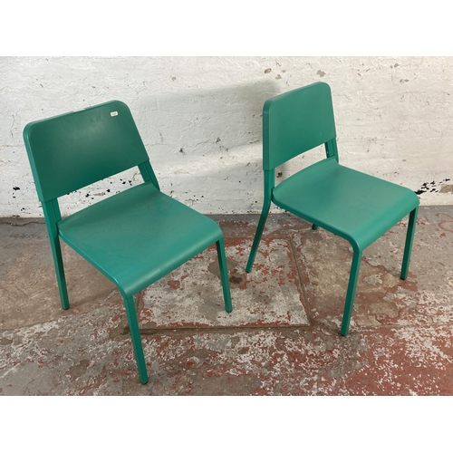 167 - A pair of IKEA Teodores green plastic and metal stacking chairs