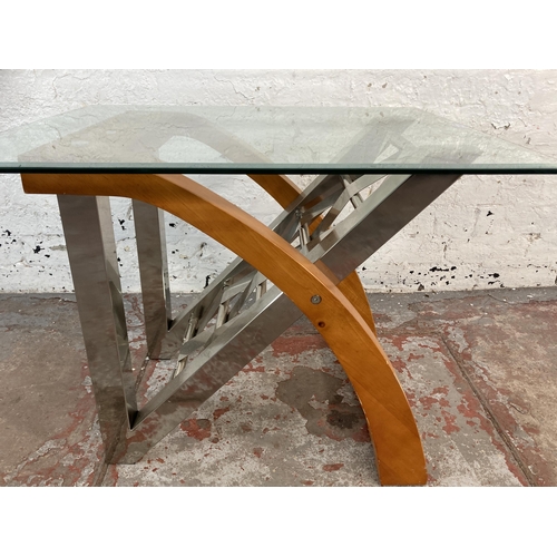 169 - A modern chrome plated and beech side table with glass top - approx. 55cm high x 61cm wide x 71cm lo... 