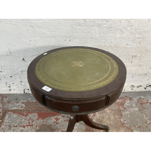 173 - A Regency style mahogany and green leather drum table - approx. 60cm high x 51cm diameter