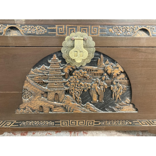 178 - A Chinese carved camphor wood blanket box - approx. 57cm high x 102cm wide x 53cm deep