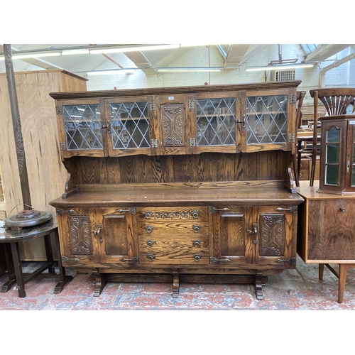 181 - A Webber Furniture carved oak dresser - approx. 163cm high x 187cm wide x 43cm deep