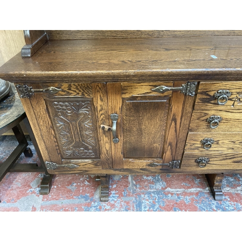 181 - A Webber Furniture carved oak dresser - approx. 163cm high x 187cm wide x 43cm deep