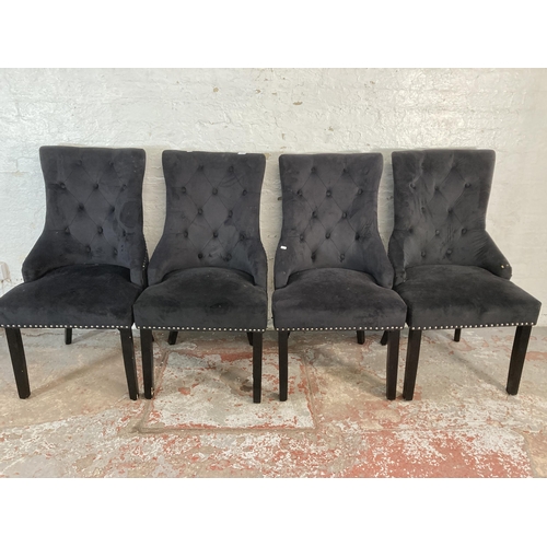 185 - Four modern upholstered button back dining chairs