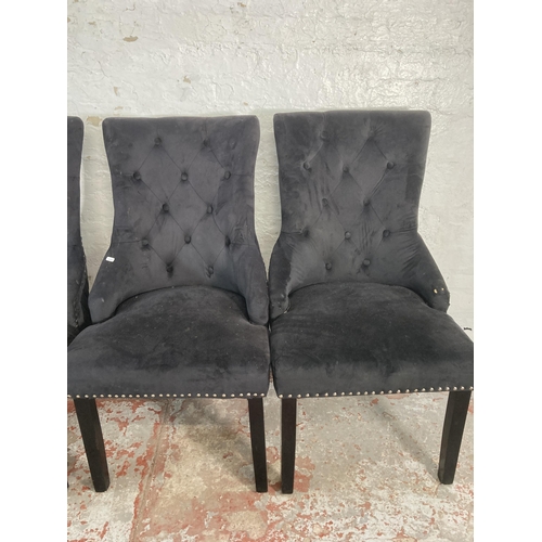 185 - Four modern upholstered button back dining chairs