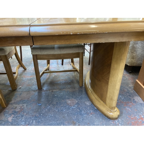 188 - An Art Deco style oak and beech extending dining table and six rattan back chairs - approx. 76cm hig... 