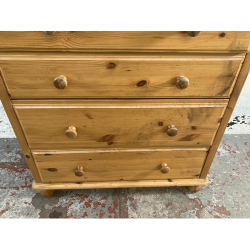 19 - A pine chest of drawers - approx. 109cm high x 85cm wide x 41cm deep