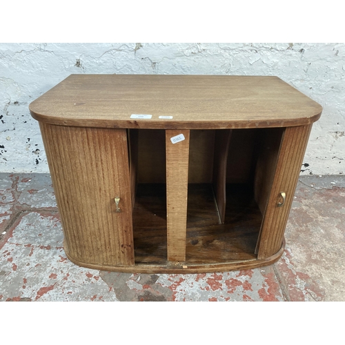 199 - A mid 20th century teak tambour door record cabinet - approx. 39cm high x 60cm wide x 39cm deep