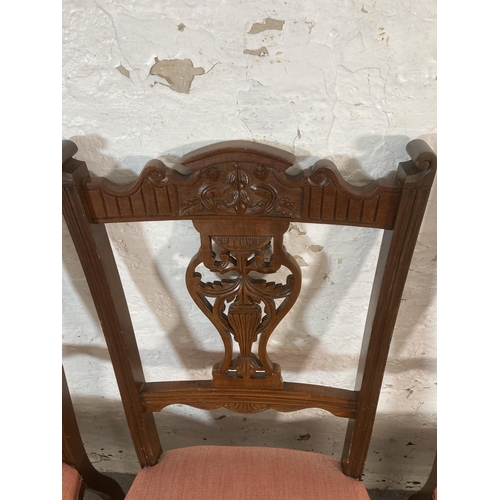 211 - Four Edwardian carved mahogany and fabric upholstered dining chairs