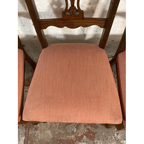 211 - Four Edwardian carved mahogany and fabric upholstered dining chairs