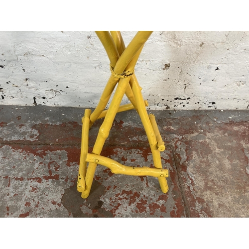 213 - A Victorian yellow painted bamboo circular top side table - approx. 72cm high x 37cm diameter