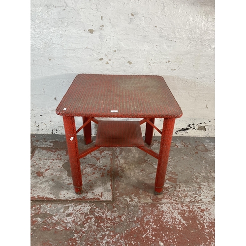 214 - A mid 20th century Lloyd Loom red painted square table - approx. 68cm high x 71cm square