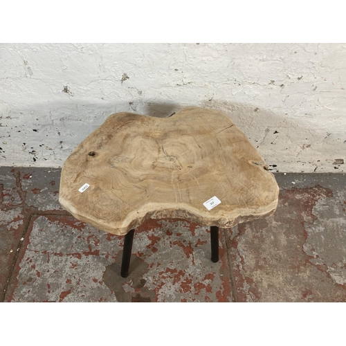 217 - A modern tree slice side table on black metal supports - approx. 45cm high x 51cm wide x 51cm deep