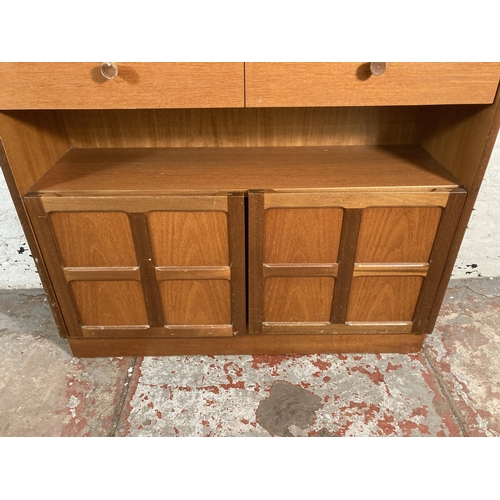 23 - A mid 20th century Nathan teak bookcase - approx. 123cm high x 87cm wide x 27cm deep