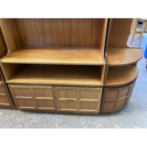 24 - Two pieces of mid 20th century Nathan teak furniture, one bookcase and one corner cabinet