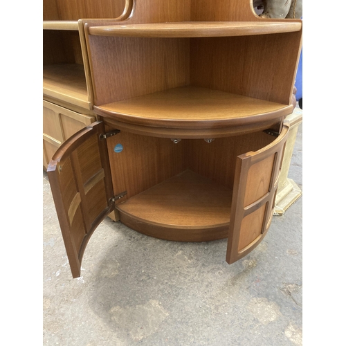 24 - Two pieces of mid 20th century Nathan teak furniture, one bookcase and one corner cabinet