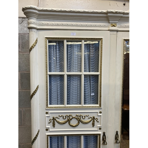 3 - A French Louis XVI style white and gold painted triple wardrobe - approx. 229cm high x 225cm wide x ... 