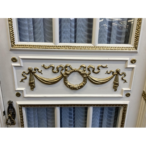 3 - A French Louis XVI style white and gold painted triple wardrobe - approx. 229cm high x 225cm wide x ... 