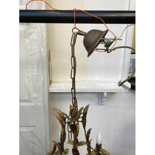 32 - A modern gilt metal six branch chandelier - approx. 80cm drop