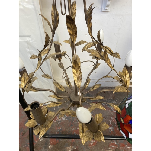 32 - A modern gilt metal six branch chandelier - approx. 80cm drop