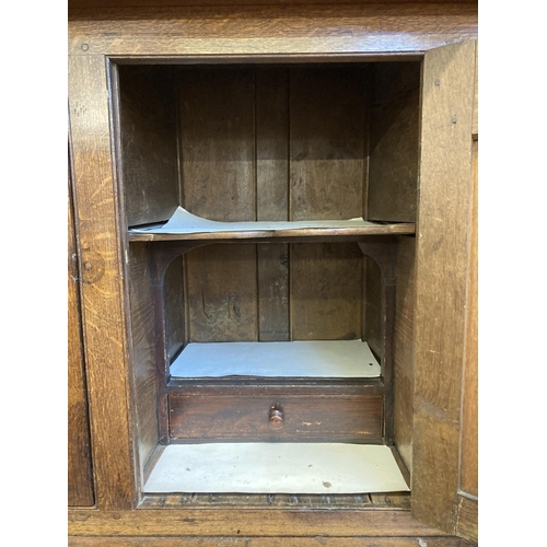 4 - An 18th century Welsh inlaid oak Deuddarn cupboard - approx. 197cm high x 144cm wide x 56cm deep