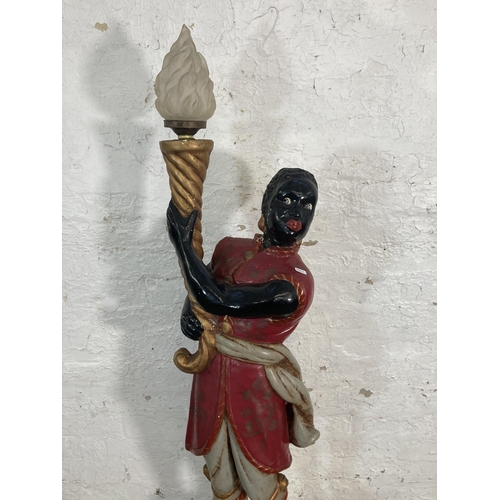 48 - An early 20th century Blackamoor polychrome painted composite floor standing lamp - approx. 176cm hi... 