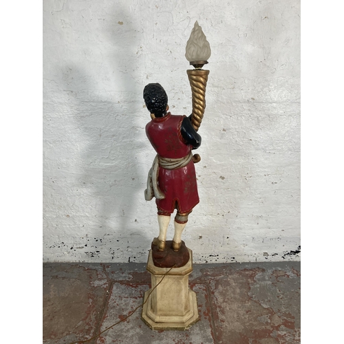 48 - An early 20th century Blackamoor polychrome painted composite floor standing lamp - approx. 176cm hi... 