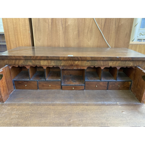 50 - A 19th century mahogany secretaire chest of drawers - approx. 120cm high x 109cm wide x 42cm deep