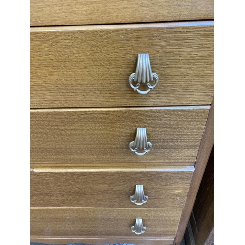 51 - A mid 20th century Lebus oak chest of drawers - approx. 92cm high x 77cm wide x 44cm deep