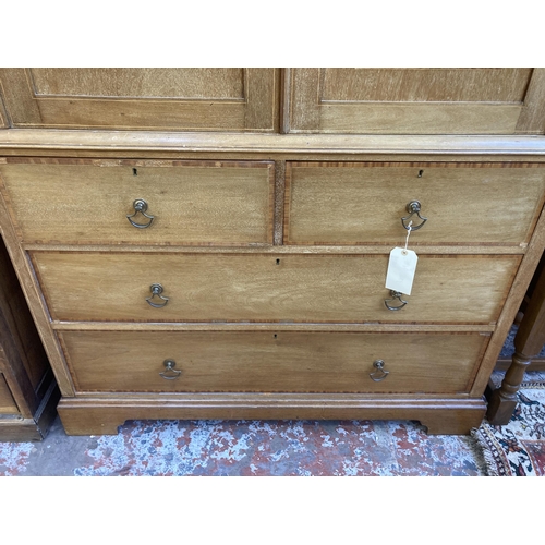 54 - A George III inlaid mahogany linen press - approx. 191cm high x 122cm wide x 50cm deep