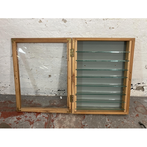 55 - A pine wall mountable display cabinet - approx. 66cm high x 51cm wide