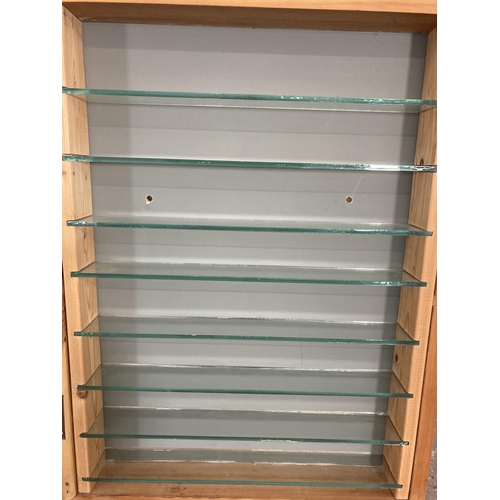 55 - A pine wall mountable display cabinet - approx. 66cm high x 51cm wide