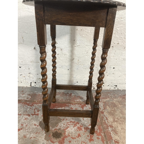 57 - An early 20th century oak pie crust edge barley twist side table - approx. 73cm high x 50cm diameter