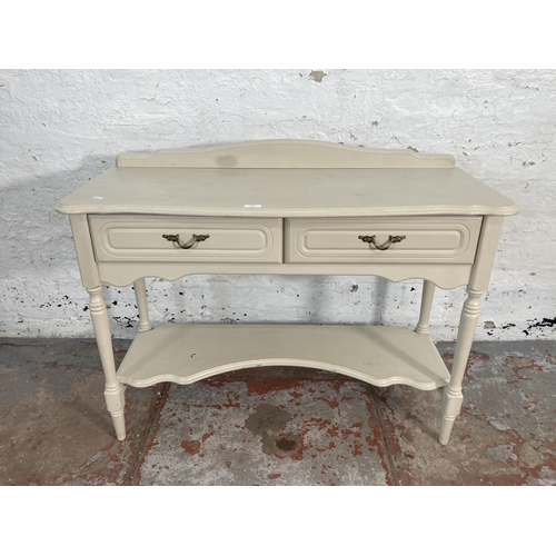 60 - A French style grey painted two drawer console table - approx. 85cm high x 107cm wide x 44cm deep