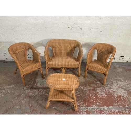 63 - A wicker four piece child’s lounge suite