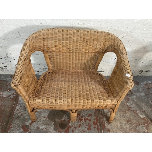 63 - A wicker four piece child’s lounge suite