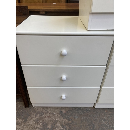 66 - Three modern white laminate bedside chests of drawers