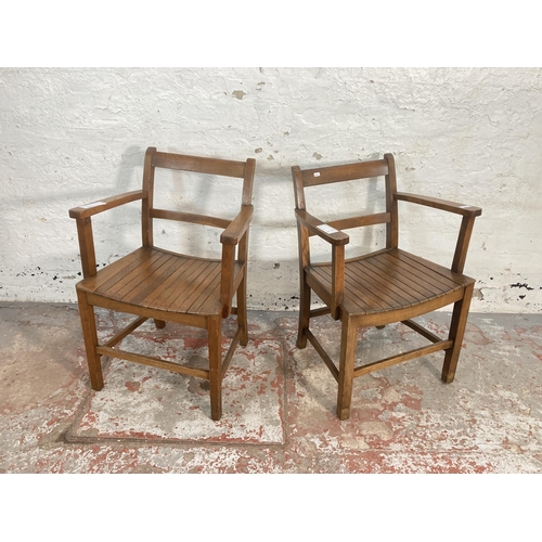 67 - Two 1940s Air Ministry elm and beech desk chairs