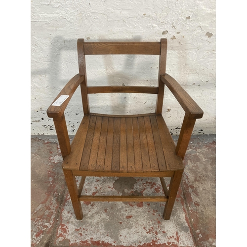 67 - Two 1940s Air Ministry elm and beech desk chairs