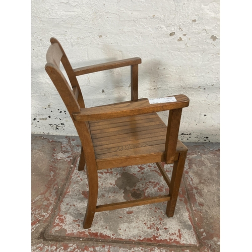 67 - Two 1940s Air Ministry elm and beech desk chairs