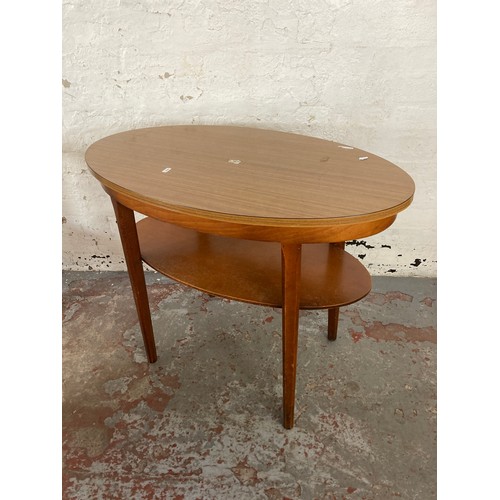 177 - Four pieces of furniture, three pine dining chairs and one mid 20th century teak effect and beech ov... 