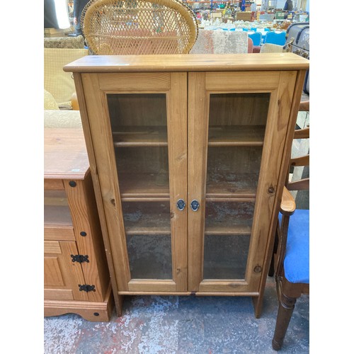 190 - Two pieces of pine furniture, one TV stand and one display cabinet