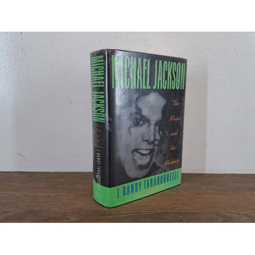 1005 - A 1991 1st edition 'Michael Jackson The Magic and the Madness' hardback book by J. Randy Taraborrell... 