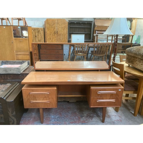 105 - A mid 20th century G Plan Fresco teak dressing table - approx. 122cm high x 145cm wide x 46cm deep