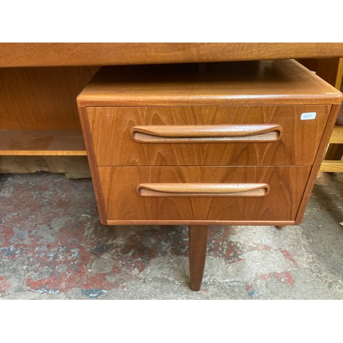 105 - A mid 20th century G Plan Fresco teak dressing table - approx. 122cm high x 145cm wide x 46cm deep